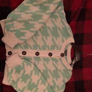 A crop top thick sweater